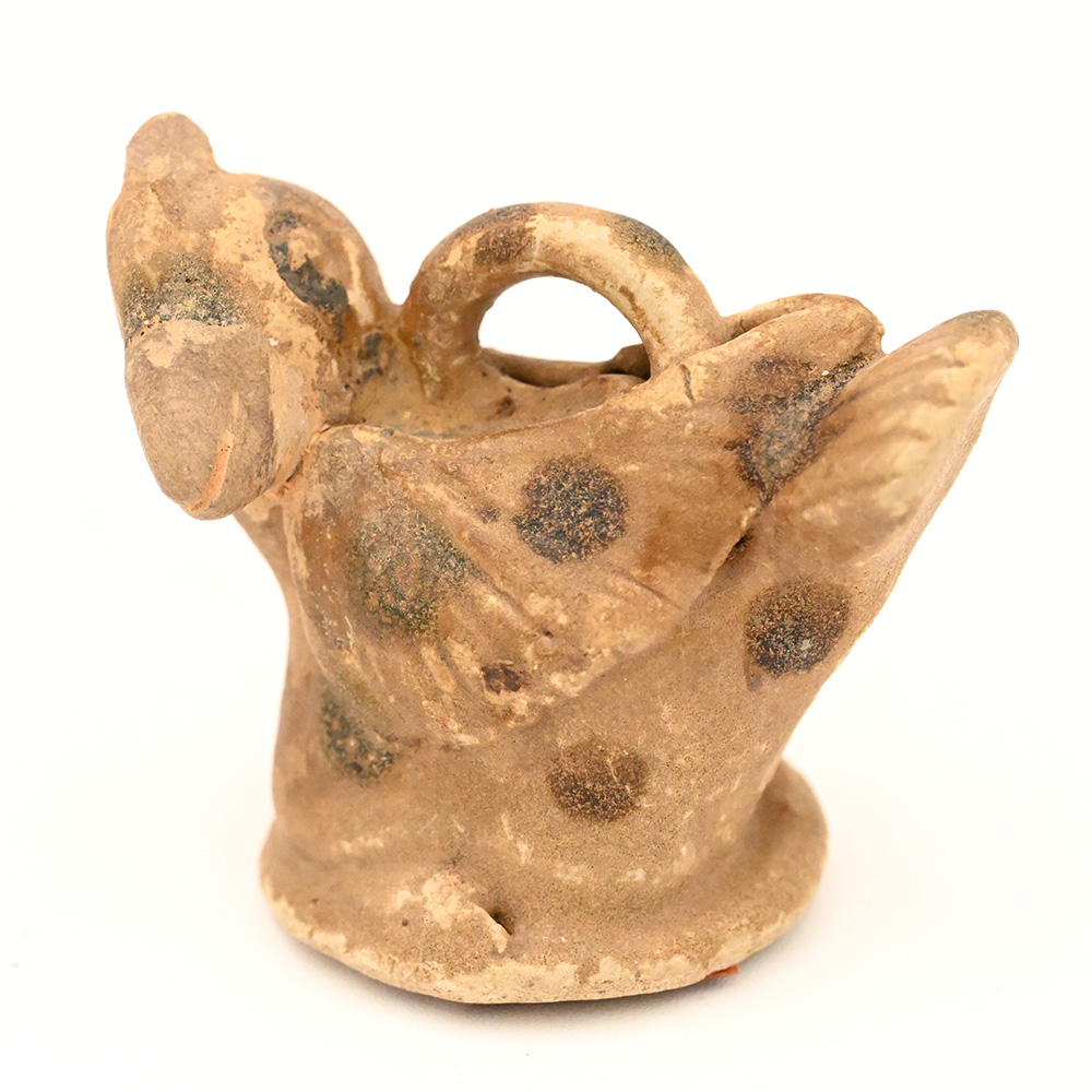 miniature ceramic figure of a bird