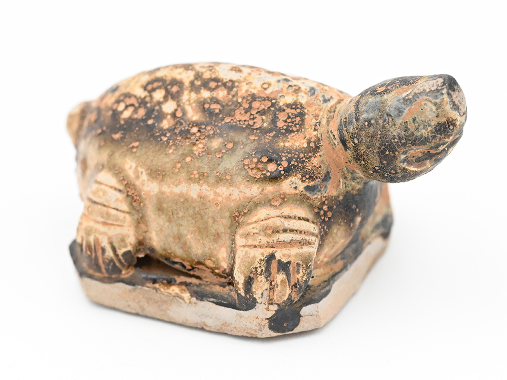 miniature ceramic figure of a tortoise