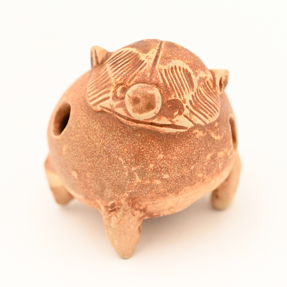 ceramic whistle in the shape of a pig