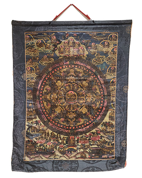 silk hanging with painting mounted in the middle