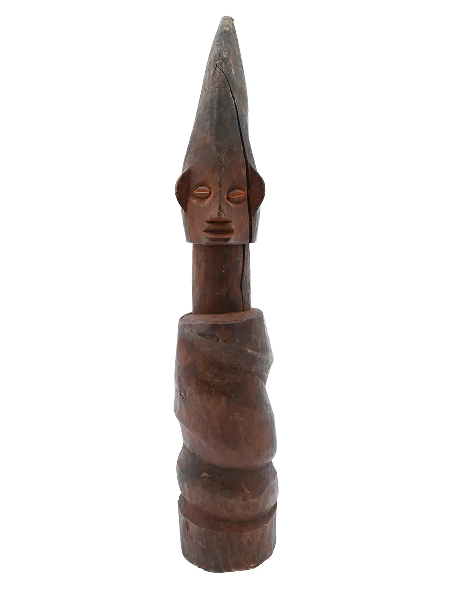 wooden figure with human head