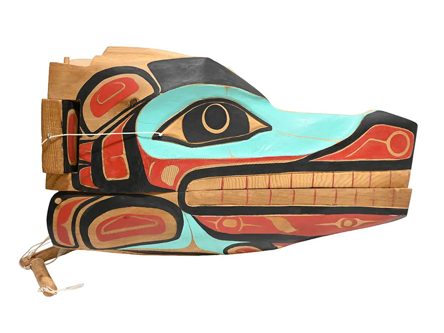 Wooden mask representing a wolf