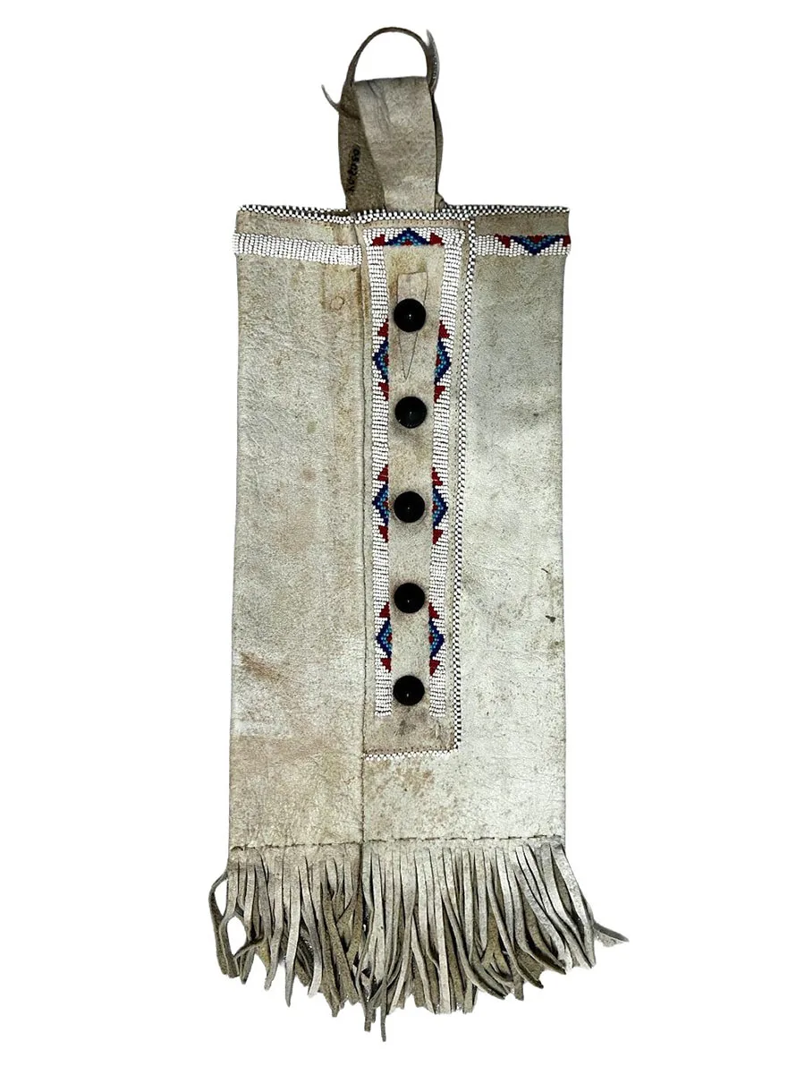 white leather bag with fringe at the bottom and strip of beadwork down the center