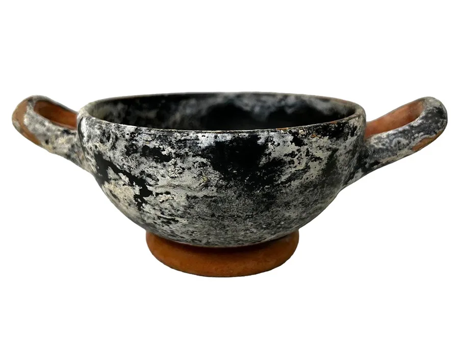 ceramic cup with black glaze and two handles