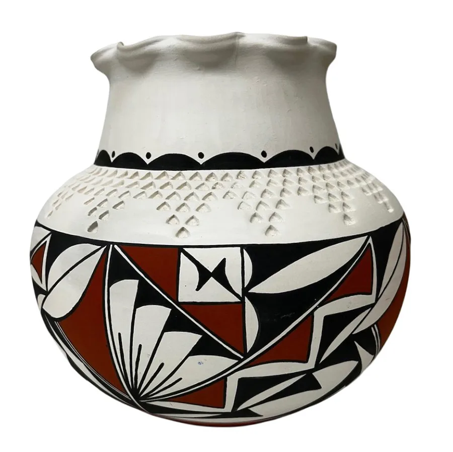 White ceramic pot with black and red decorations