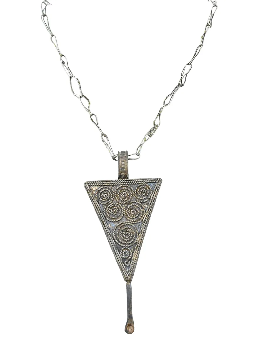 necklace with inverted triangle pendant with tiny spoon attached at the bottom