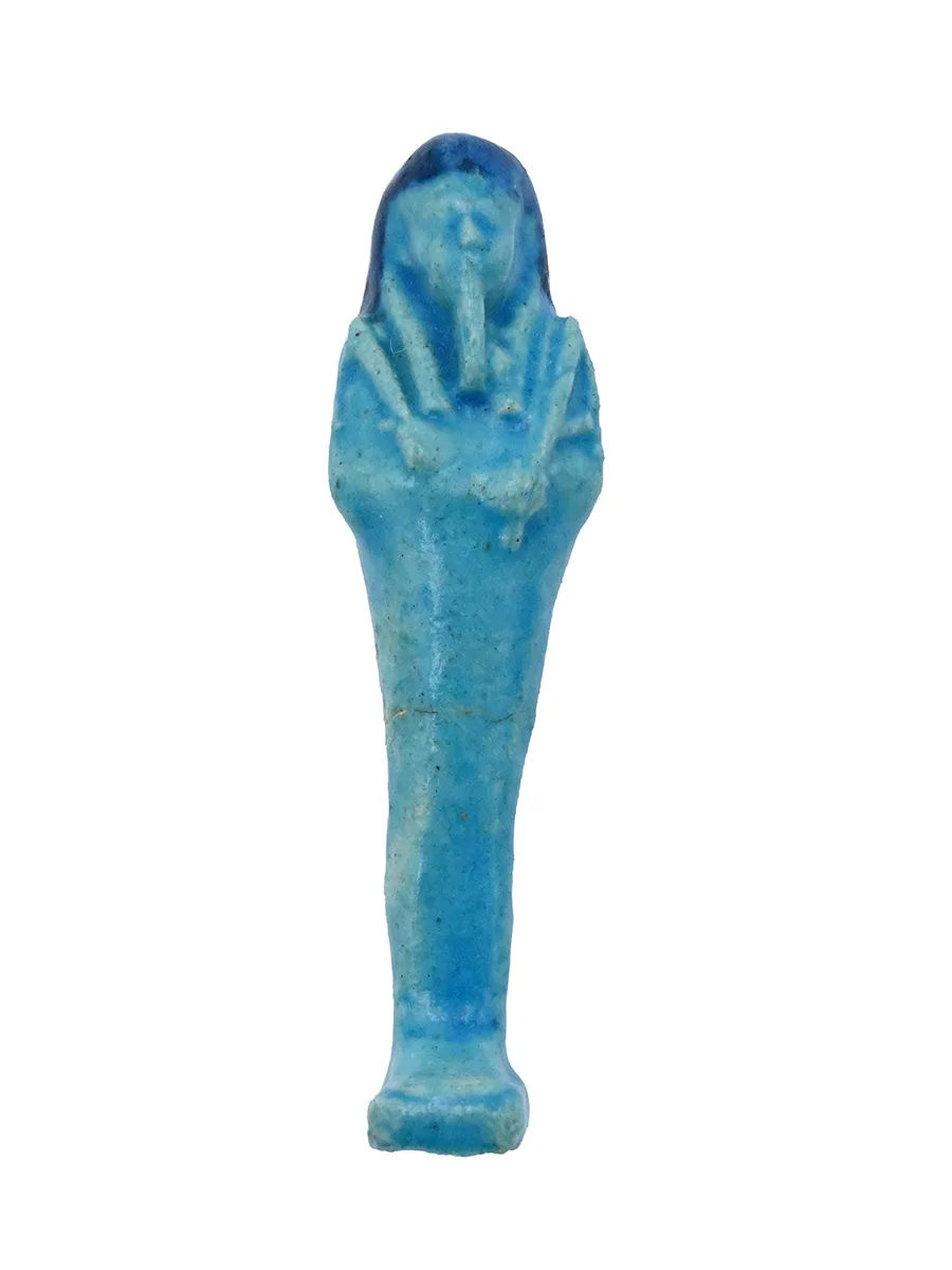 small blue ceramic figure in the shape of a man