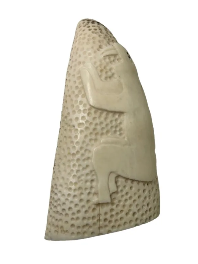 carving from a sperm whale tooth