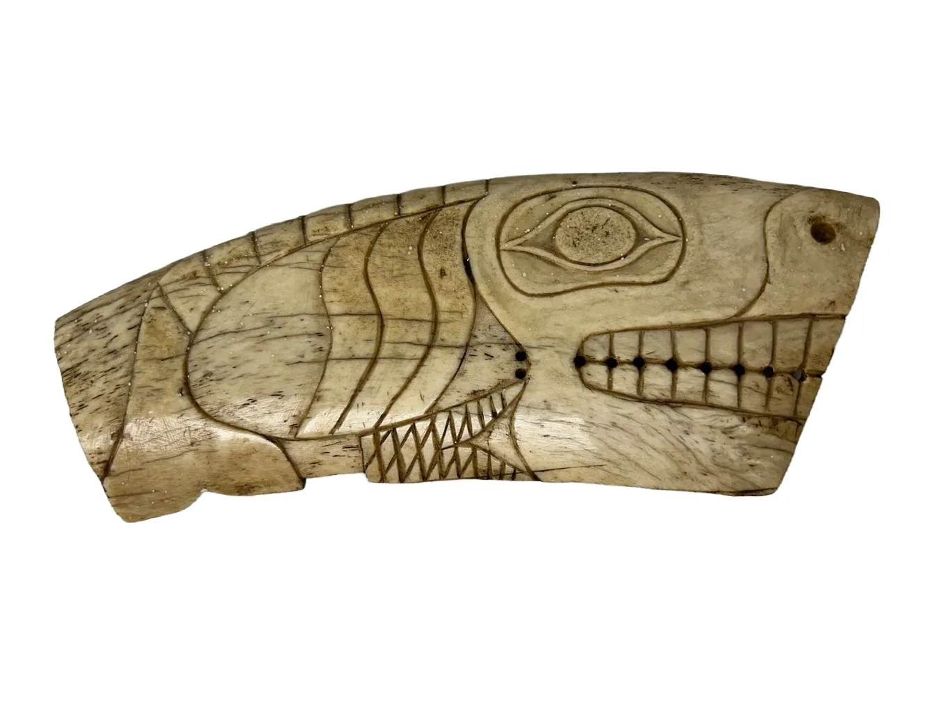 carving in the shape of a whale