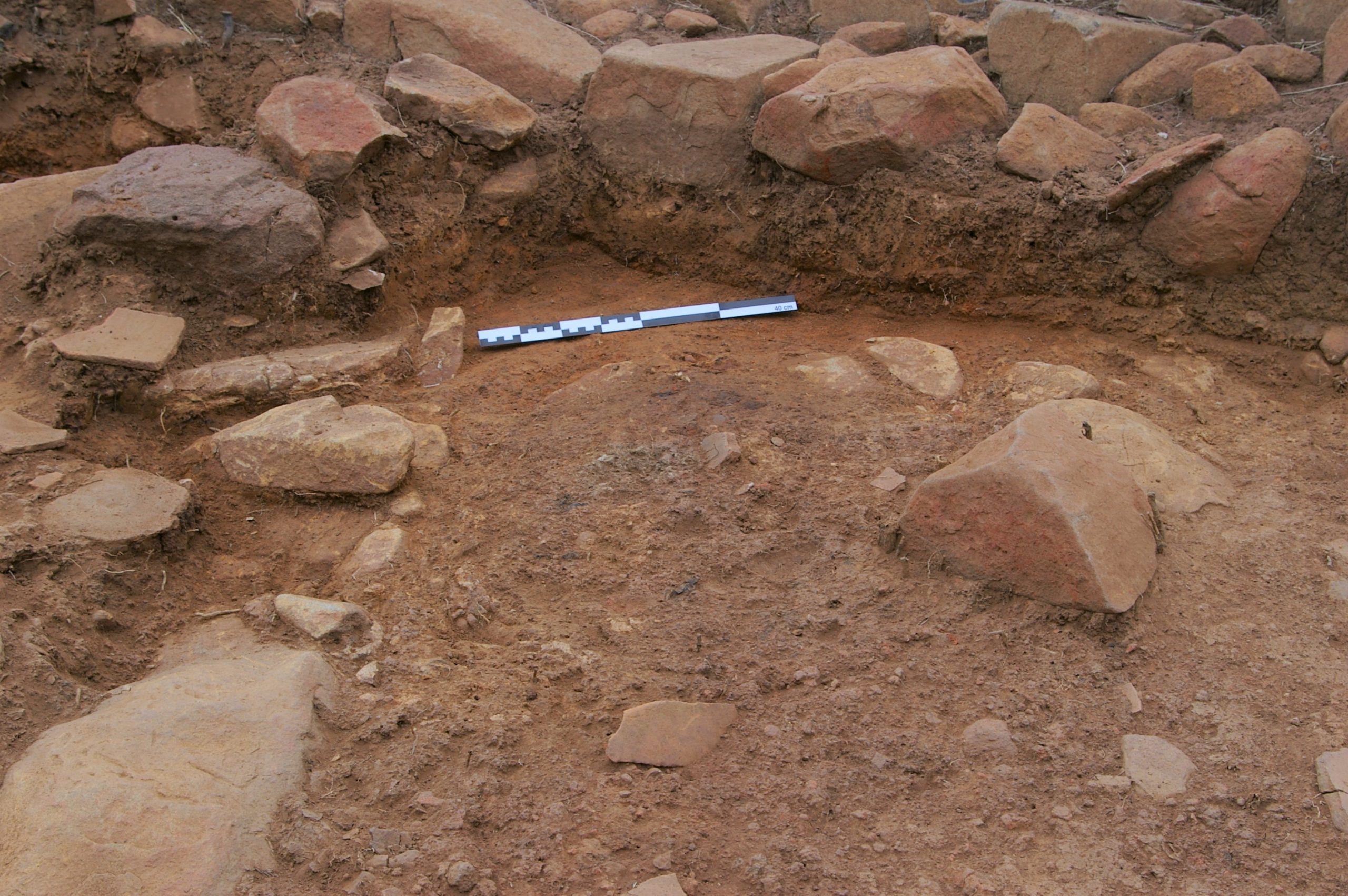 Portland Dig site - large boulders, measuring apparatus