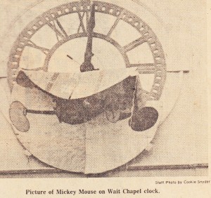 Newspaper photo showing Mickey Mouse on the Wait Chapel clock.