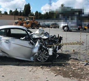 Measurements and photographs of crashed vehicles are used by Stitzel’s team to assess damage and determine injury causation. Photos courtesy CIREN