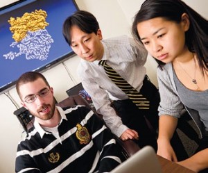Sam Cho, an assistant professor of physics and computer science, and students, including Anqi Zou ('12)
