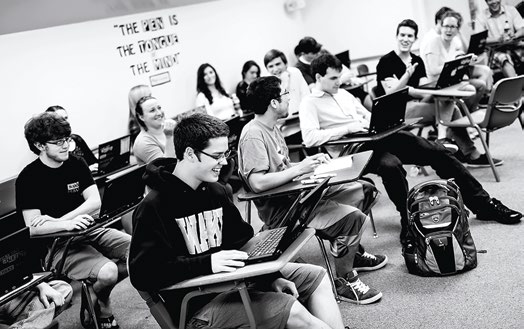 Wake debaters enjoy a moment of levity at a weekly squad meeting