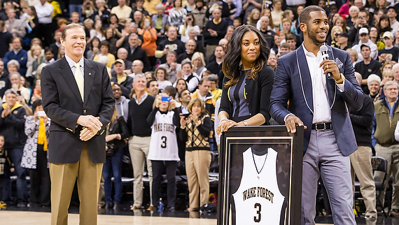 Chris and Jada Paul at the jersey ceremony with Ron Wellman, director of athletics