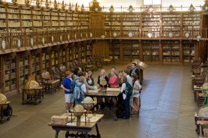 Students and their resident professor, Javier Garcia Garrado, in the Old Library at the University of Salamanca.