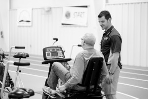 Photos from the Wake Forest HELPS program, at the Health and Exercise Science clinical research facility, on Monday, March 16, 2015. HES graduate student Seth Christopher talks with a participant.