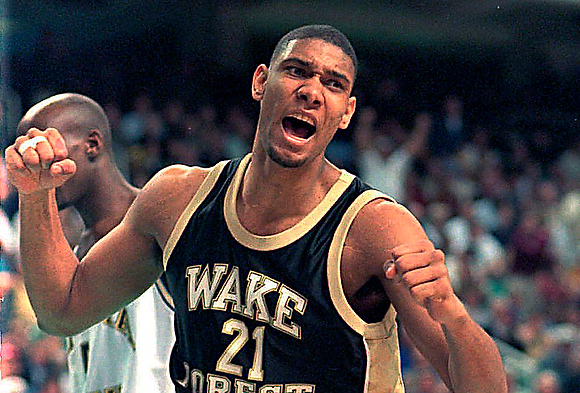3/11/96 1A BOB LEVERONE/Staff TWICE AS NICE: Wake Forest's Tim Duncan had plenty to celebrate Sunday. The Deacons' 75-74 victory over Georgia Tech gave them their second straight ACC title. Wake Forest enters the NCAA tournament as the No. 2 seed in the Midwest. Coverage in Sports, Page 1B. (UNPUBLISHED NOTES:) (3/10/96) Tim Duncan celebrates after a basket in the first half of the ACC final. Photo by Bob Leverone