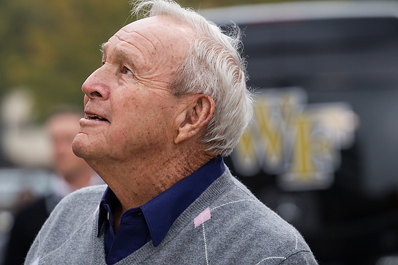 Wake Forest hosts its Homecoming 2013 celebration at BB&T Field on Saturday, October 19, 2013. Golf legend Arnold Palmer opens the gate and rides the motorcycle to start the game.