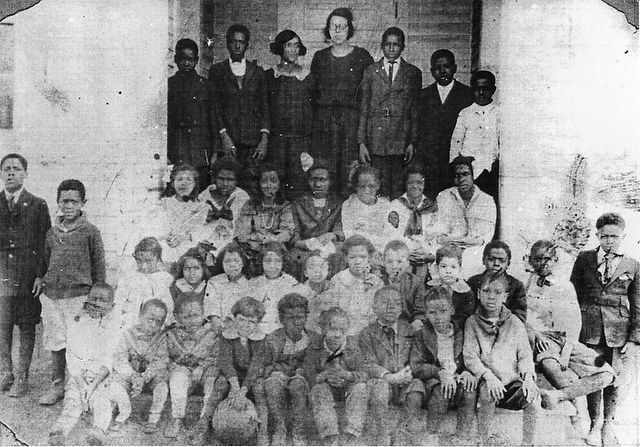 Some African-American farm workers and their families lived in the nearby Five Row community.
