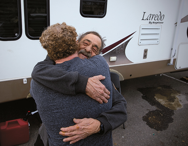 Faircloth is embraced by Norm Bourgeois in Chico, CA.