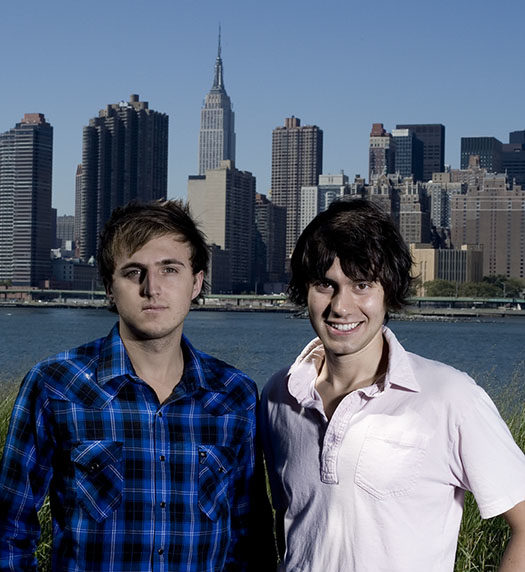 Klein and Ricky Van Veen stand in front of the New York City skyline. Their company CollegeHumor.com moved there after it was founded at Wake Forest and operated for a short time in San Diego.