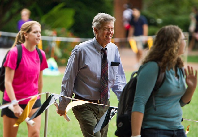 Bill Wells walks around Hearn Plaza during Hit the Bricks