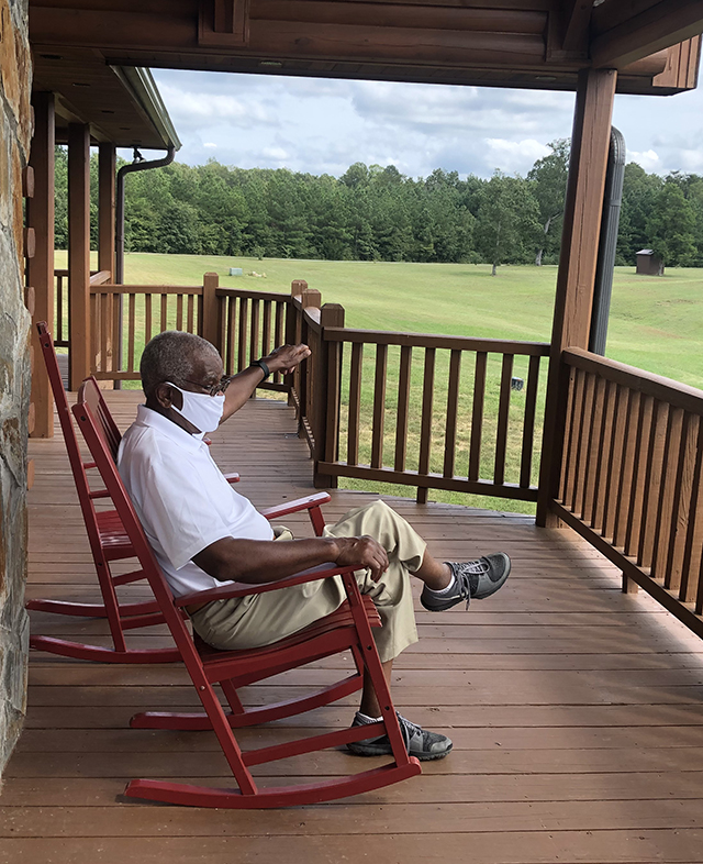 Percy Baynes on his front porch