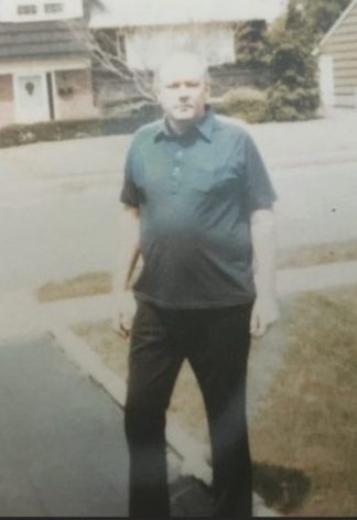 Richard "The Iceman" Kuklinski, a mob hitman, stands in his driveway at his home in Dumont, NJ, as investigators try to interview him.