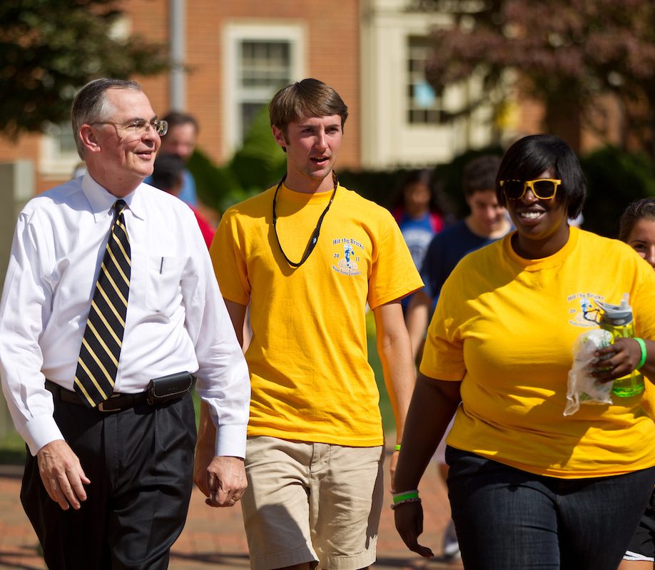 Hatch joins students for Hit the Bricks, the annual communitywide event to raise money for the Brian Piccolo Cancer Research Fund