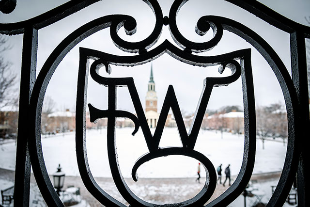 The distinctive WFC ironwork frames a snowy scene on the Quad.