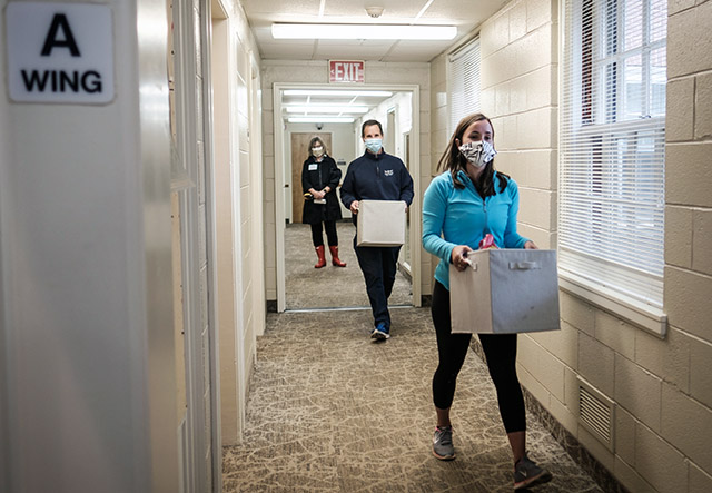 Wake Forest first year student Caitlyn Dwyer (’23) gets some help from her dad, David Dwyer, as she moves out of her room in Babcock Residence on Wednesday, May 20, 2020. The students were moving out individually over several weeks in response to the COVID-19 pandemic.