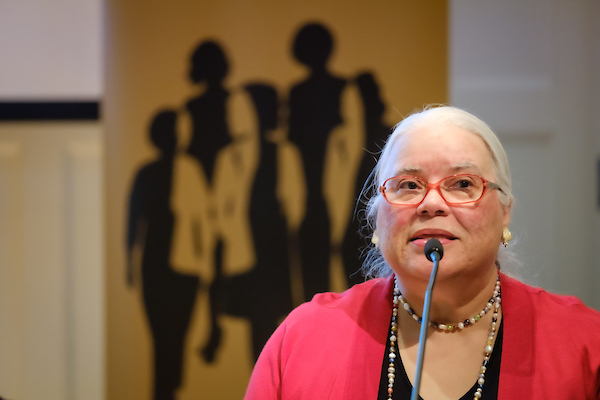 Mutter Evans at the microphone for a panel at Wake Forest.