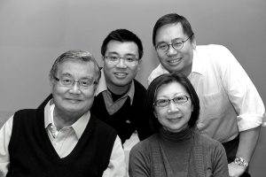 Timothy S. Y. Lam (‘60), his wife, Ellen, and their sons, Marcus (‘98), center, and Tim (‘93).