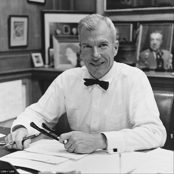Black and white headshot of J. Gordon Hanes Jr. sitting at his desk.