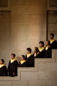 The Wake Forest Chamber Choir sings in the stairwells of Wait Chapel.