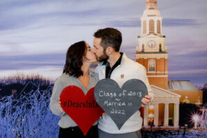 Lauren Hiznay (‘13) and JP Rotchford (’13, MSA ’14) pose for a portrait.