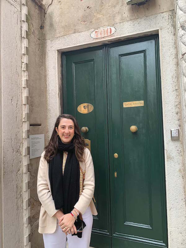 Tonis Montes out front of the dark green door of Casa Artom.