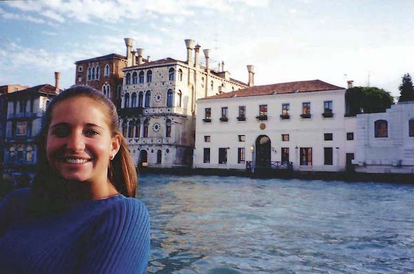 Alice Green Brown on the Grand Canal with Casa Artom behind her.