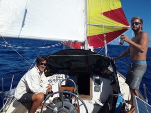 Eric Bihl and Kennon Jones on their sailboat
