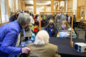 Guests visit with Dr. Ed Wilson and his wife Emily Wilson during Dr. Wilson's 100th Birthday Celebration at the ZSR Library, West Ammons Gallery on Friday, February 3, 2023.