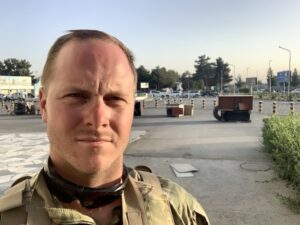 Ethan Groce (‘13) was stationed outside the South Gate at Hamid Karzai International Airport (HKIA) for the final days of the United States’ presence in Afghanistan. The South Gate was the primary gate for civilians seeking refuge from the Taliban.