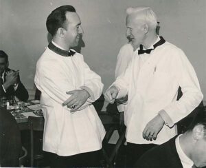 Ed Wilson and Ed Christman waiting tables in the Magnolia Room to sponsor Ed Reynolds' coming to WFU from Ghana