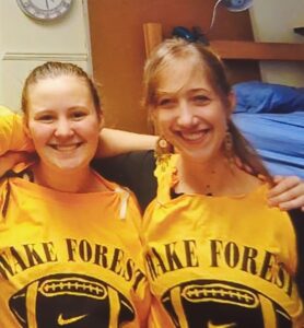 Rives with Johanna Young (’08) in customized shirts