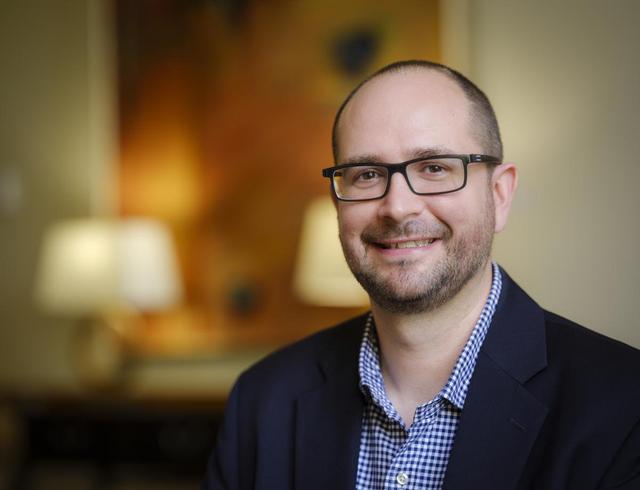 Jarrod Atchison (’01, MA ’03), the John Kevin Medica Director of Debate and professor of communication. Photo by Ken Bennett