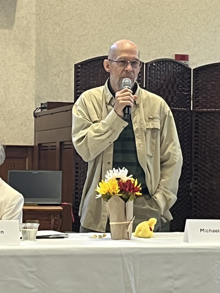 Michael Boing uses a stuffed duck as a prop.