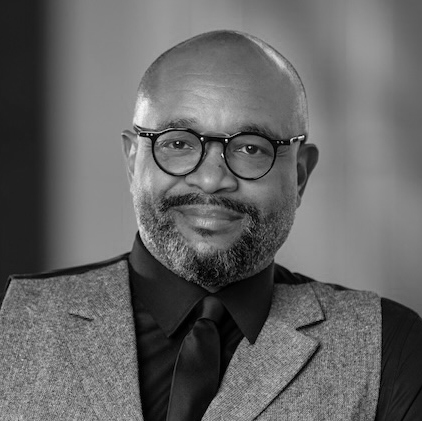 Black and white headshot of Chad Cheek