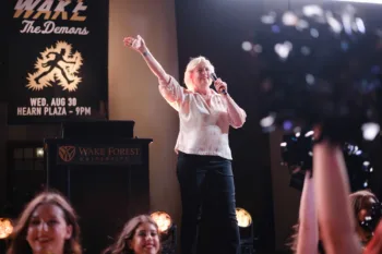 Wente speaks at a 2023 Wake the Demons pep rally. 