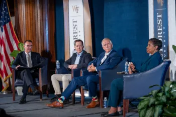 Michael Lamb, senior executive director of the Program for Leadership and Character, moderates a panel with Max Stier, U.S. Sen. Thom Tillis, D-N.C., and former U.S. Rep. Donna Edwards, D-Md. 