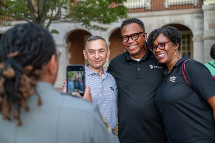 Wake Forest University puts on a block party for the New Deacs and their families on Hearn Plaza on Tuesday, August 18th, 2026. 


President Peter Rodriguez talks with students and families at the block party.